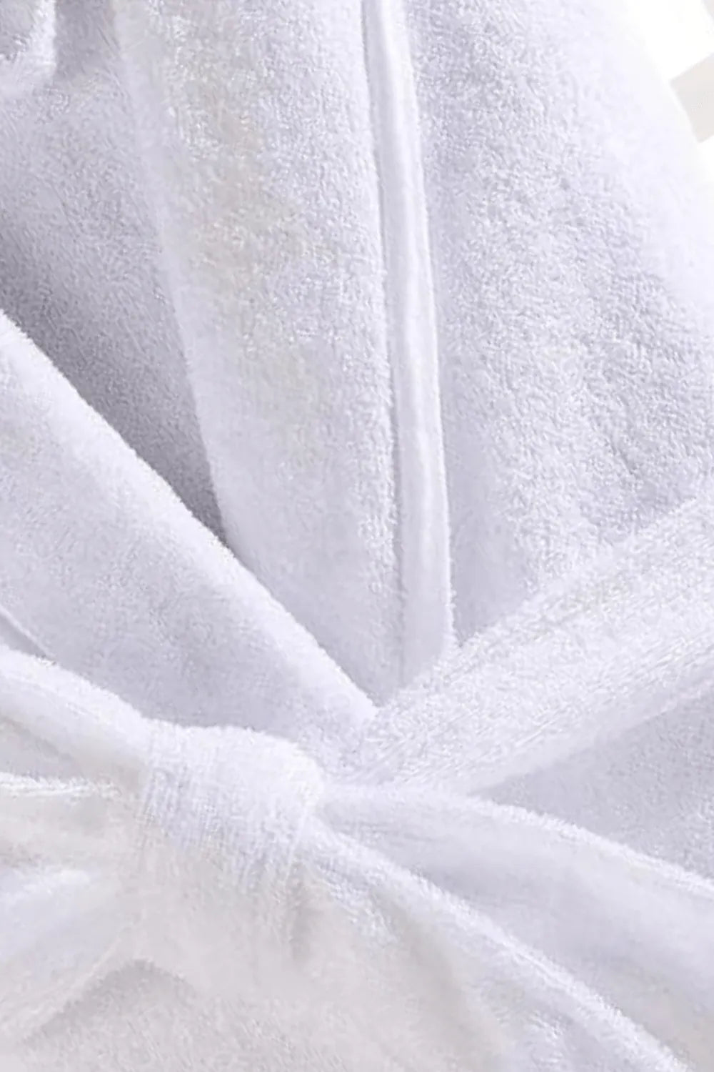 Peignoir élégant blanc pour détente et relaxation