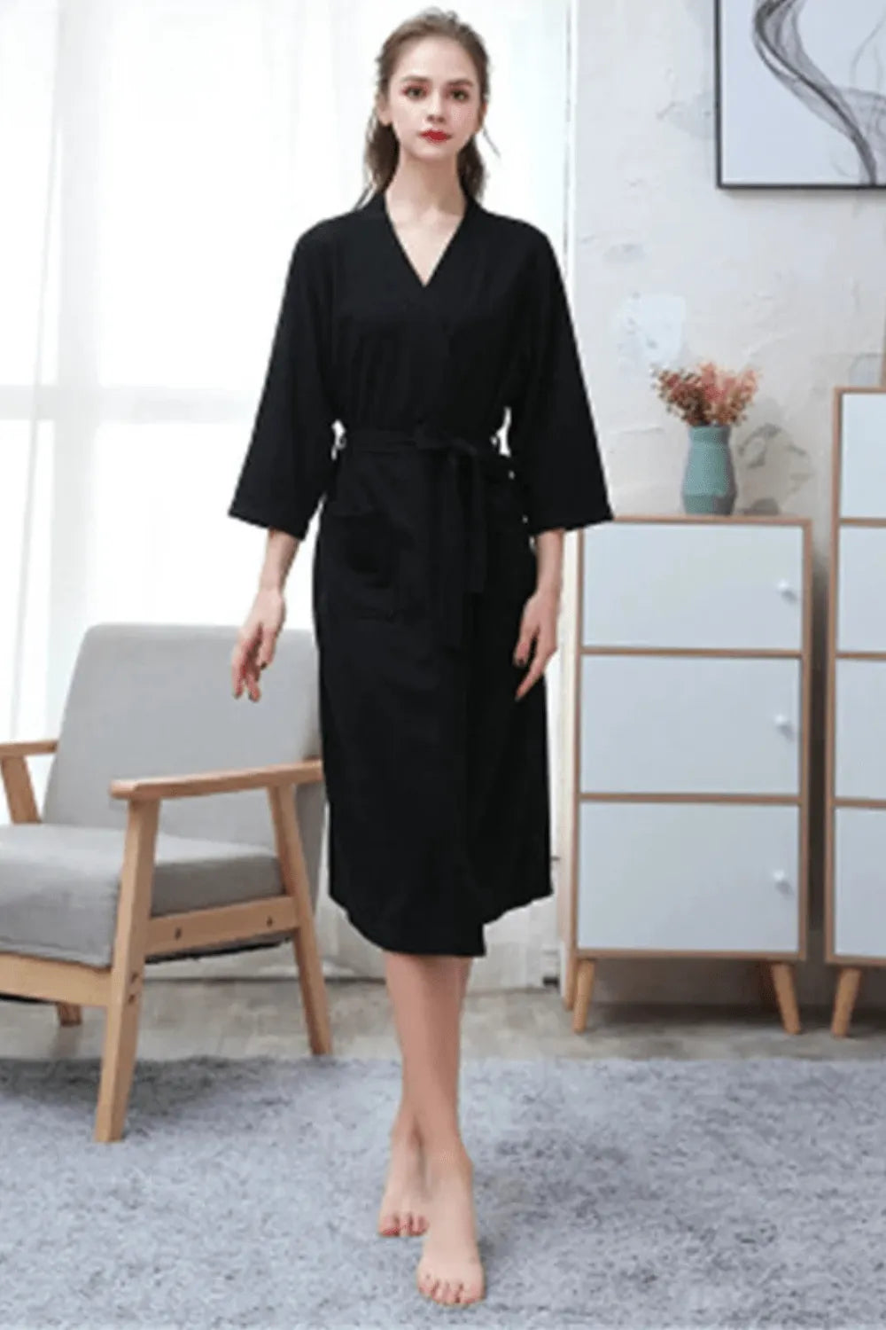 Peignoir noir élégant pour moments de détente