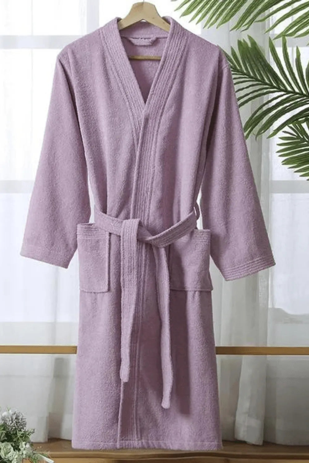 Peignoir éponge confortable pour moments de détente